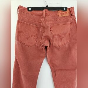 Levi's orange jeans
